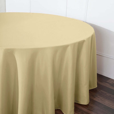 Round beige tablecloth draping elegantly over a table.