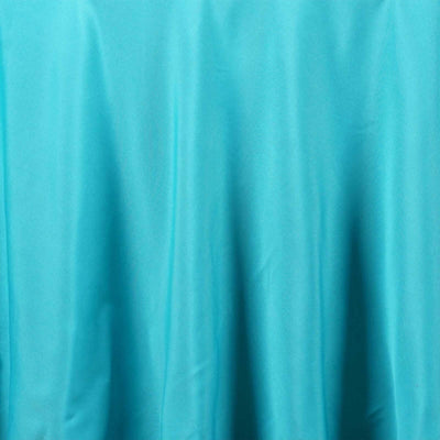 Teal fabric with smooth texture and drapes elegantly.