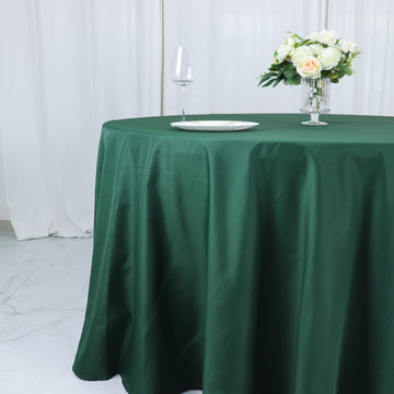 Enhance Your Dining Experience with the Hunter Emerald Green Seamless Polyester Round Tablecloth 132