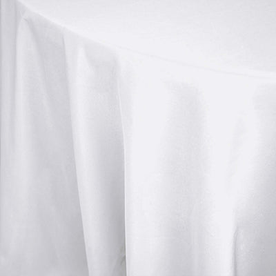 White tablecloth draping elegantly over a table edge.