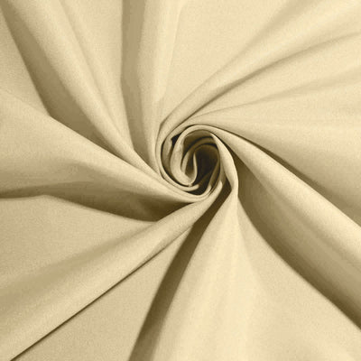 Beige fabric swirl showcasing texture and detail.