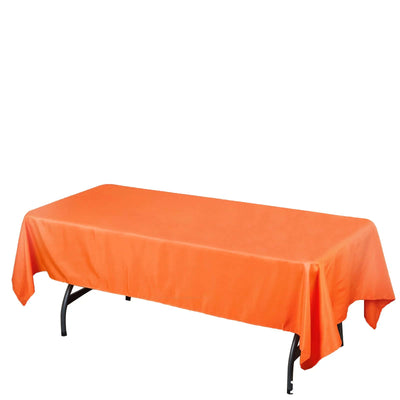Orange rectangular tablecloth on a folding table