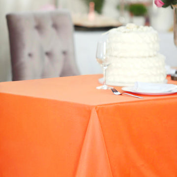 Elevate Your Dining Experience with the Orange Seamless Polyester Rectangular Tablecloth
