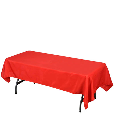 Red tablecloth draped over a rectangular table