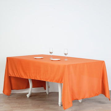 Create a Colorful and Stylish Setting with the Orange Seamless Polyester Rectangular Tablecloth