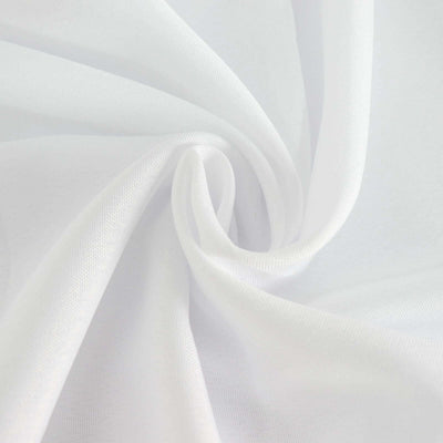 Soft white fabric with gentle folds and texture.