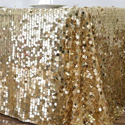 Gold sequin tablecloth draped elegantly over a table.