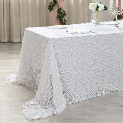 White sequin tablecloth draping elegantly over a table