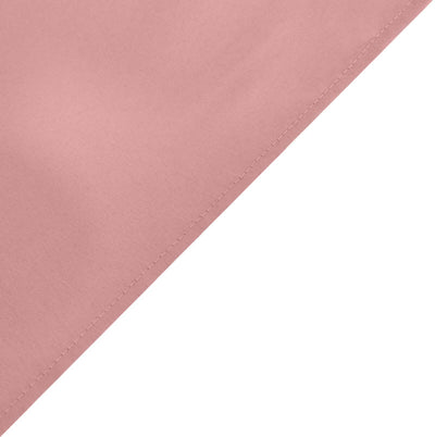Pink fabric corner close-up showcasing smooth texture and quality.