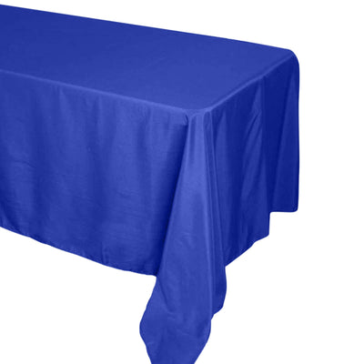 Blue tablecloth draped over a table, showcasing vibrant color and fabric texture.