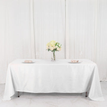 Elevate Your Event Decor with a White Seamless Polyester Rectangle Tablecloth