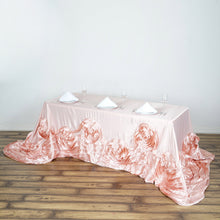 90 Inch x 156 Inch Rose Gold Blush Satin Rectangular Tablecloth With Large Rosettes