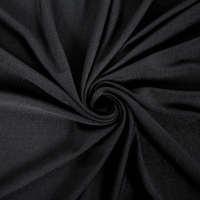 Black fabric with a smooth, soft texture in a swirling pattern.