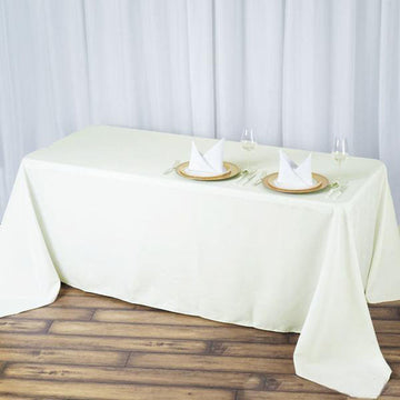 Elevate Your Event with the Ivory Seamless Premium Polyester Rectangular Tablecloth