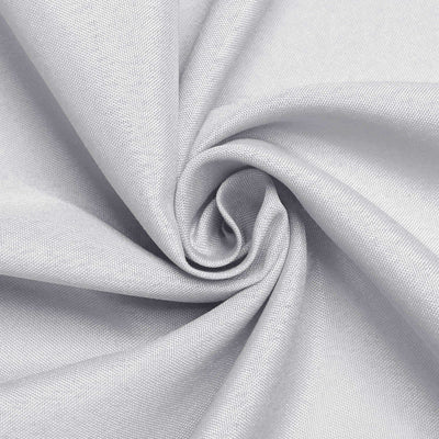 Light grey fabric with a soft, textured surface in a spiral formation.