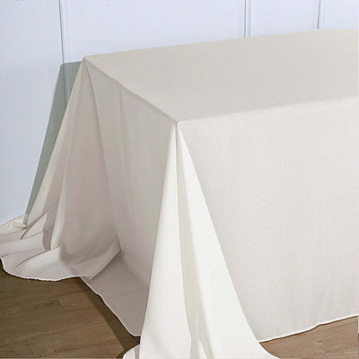 White tablecloth draped elegantly over a table.
