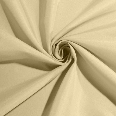 Beige fabric swirl showcasing soft texture and smooth finish.