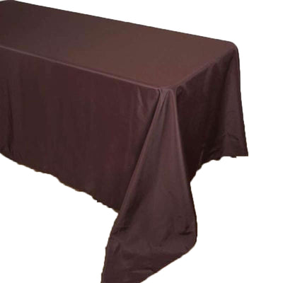 Brown tablecloth draped over a table, showcasing its full shape.