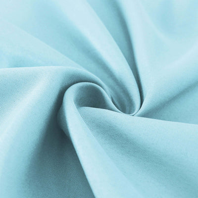 Light blue fabric texture with soft, smooth finish.