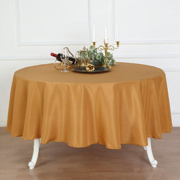 Add Elegance to Your Event with the Gold Seamless Polyester Round Tablecloth