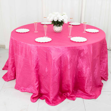 Add a Touch of Glamour to Your Event with the Fuchsia Accordion Crinkle Taffeta Seamless Round Tablecloth 132