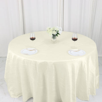 Complete Your Event Décor with the Ivory Accordion Crinkle Taffeta Tablecloth