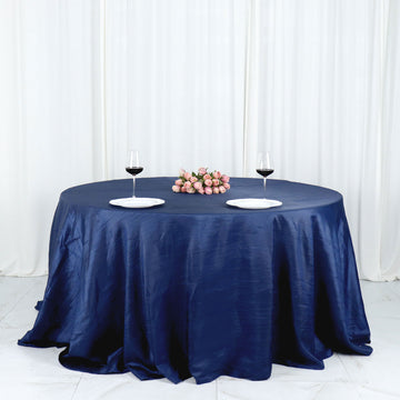 Create Memorable Moments with the Navy Blue Accordion Crinkle Taffeta Seamless Round Tablecloth 132"