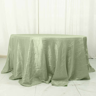 Green round tablecloth draped elegantly over a table