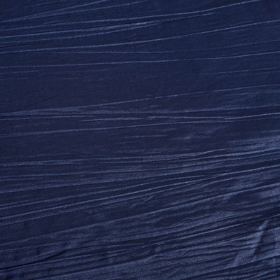 Navy blue textured fabric with subtle wave patterns.