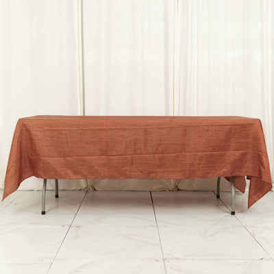 Brown tablecloth on a folding table, draping elegantly.