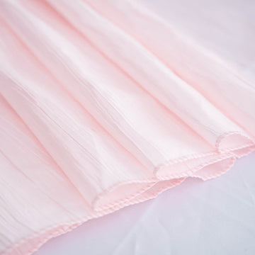 Create an Unforgettable Event with the Blush Accordion Crinkle Taffeta Seamless Rectangular Tablecloth