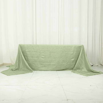 Elevate Your Event with the Sage Green Accordion Crinkle Taffeta Seamless Rectangular Tablecloth