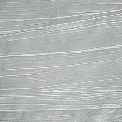 Textured silver fabric with subtle creases and waves.