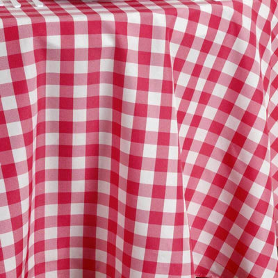 Red and white checkered tablecloth draping over a table.