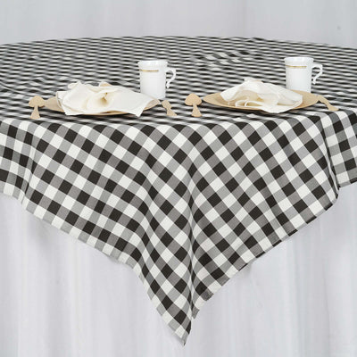 Black and white checkered tablecloth with dining setup