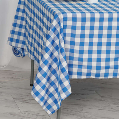 Blue and white checkered tablecloth draped over a table.