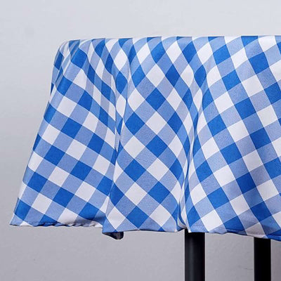 Blue and white checkered tablecloth draped over a table edge.