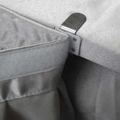 Gray fabric with metal clip detail for storage or organization.
