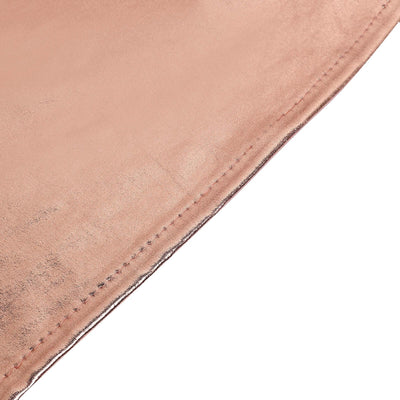 Rose gold fabric close-up showcasing smooth texture and stitching details.