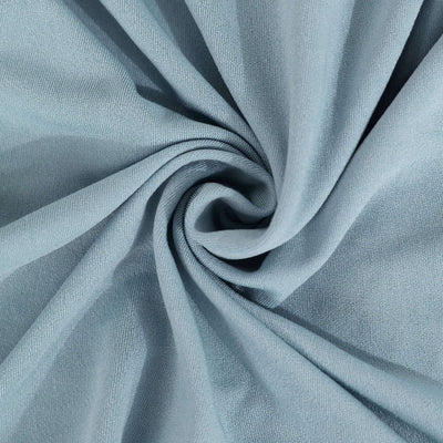 Soft blue fabric texture in a swirling pattern.