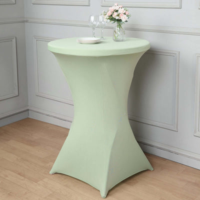 Mint green stretch table cover for cocktail tables, elegant and versatile.
