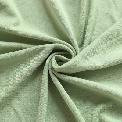Soft green fabric texture with smooth finish.