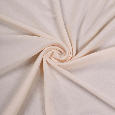 Soft beige fabric with a smooth, swirling texture.