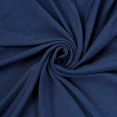 Navy blue fabric swirl texture for fashion and design use.