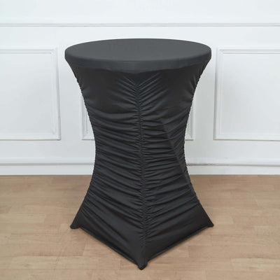 Black stretch table cover for cocktail tables.