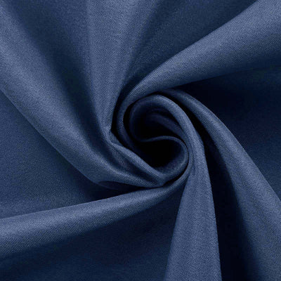Navy blue fabric swirl showcasing texture and design details.