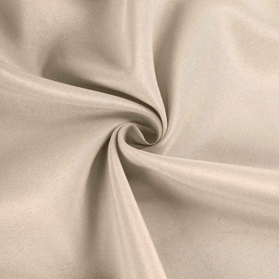 Beige fabric texture with a smooth, swirling pattern.