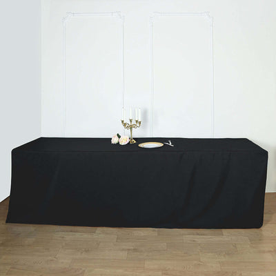 Black tablecloth draped elegantly over a table with decorative elements.