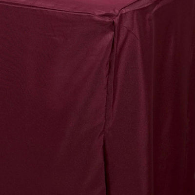 Burgundy tablecloth draped over a table