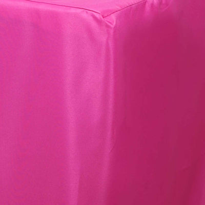 Pink tablecloth corner on a plain background.